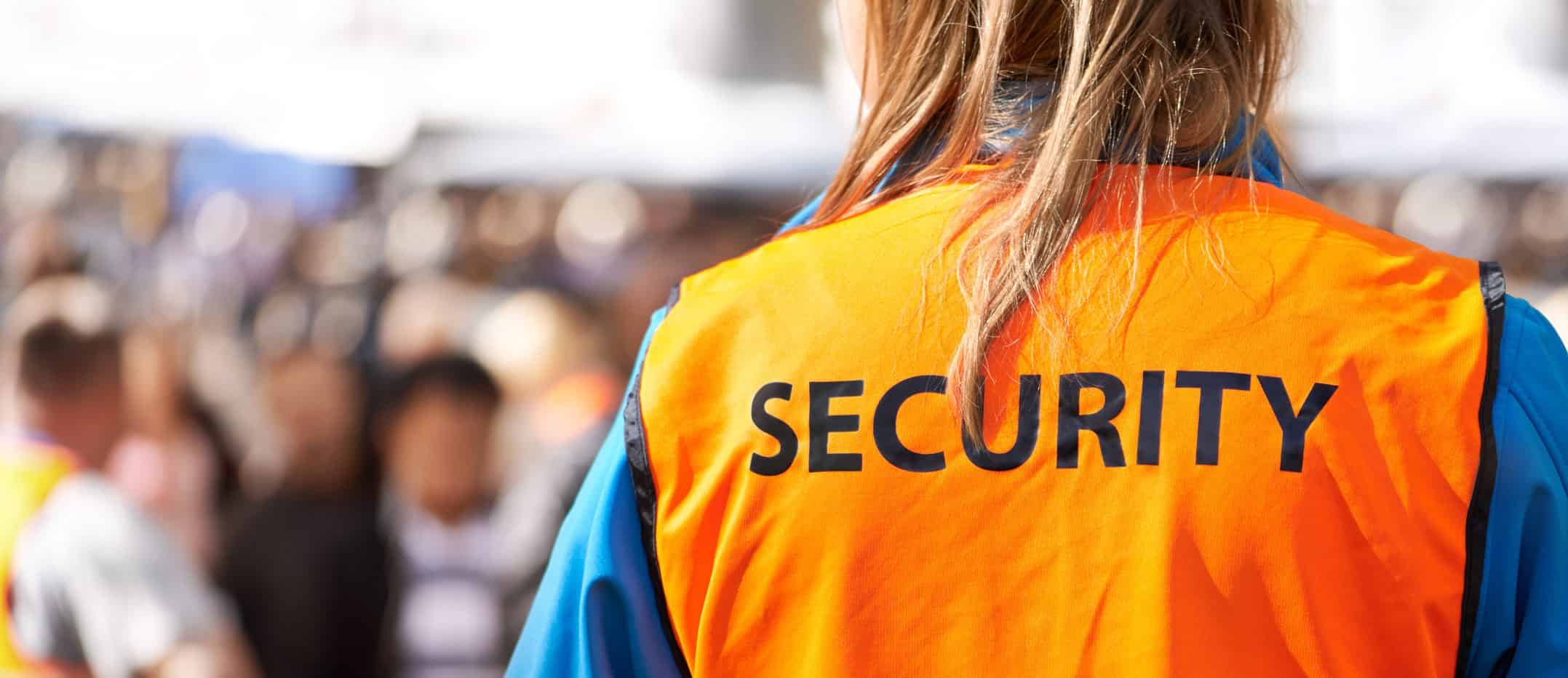 security with orange vest